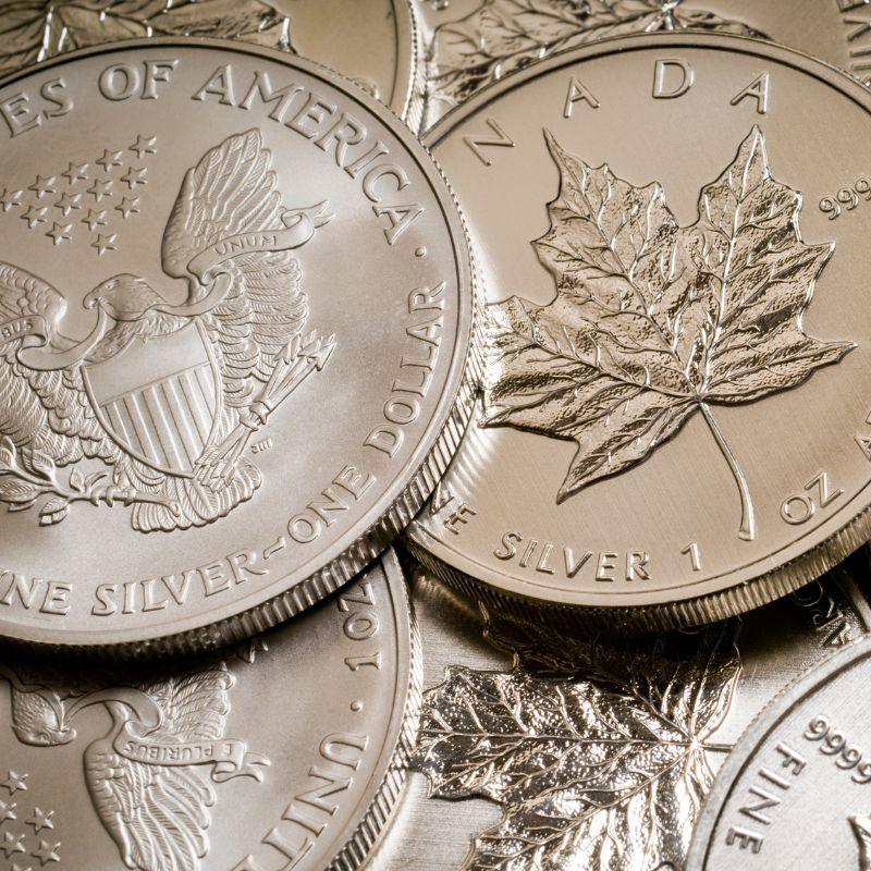 1 oz Silver American Eagle Dollar and 1 oz Canadian Maple Leaf Silver Round